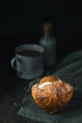 Braided bread on rustic background