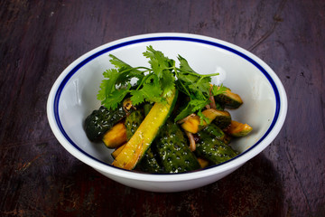 Pickled green cucumbers