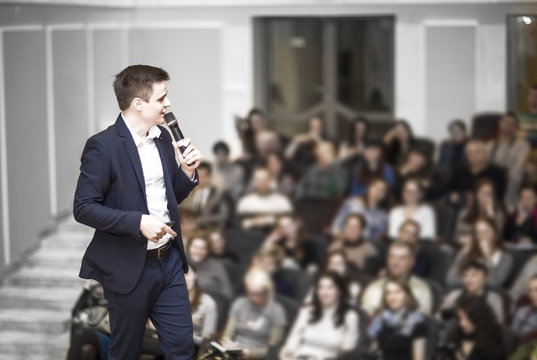 successful businessman holds business conference for the press