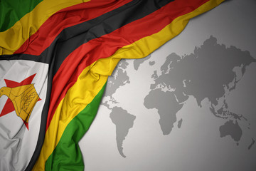 waving colorful national flag of zimbabwe. - obrazy, fototapety, plakaty