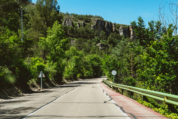 Rural road and road trip to nature in the mountain and forest.