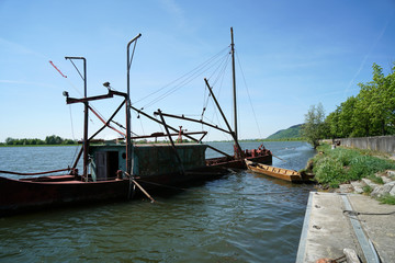 One of the last big professional fishermen ships on the Danube near Regensburg in Germany
