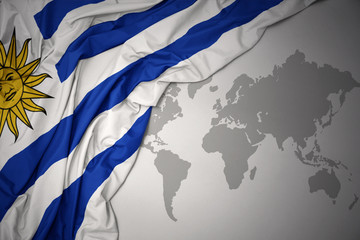 waving colorful national flag of uruguay.