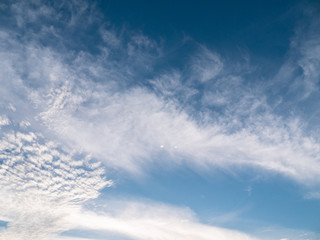 Naklejka na ściany i meble Blue sky background with clouds, background sky