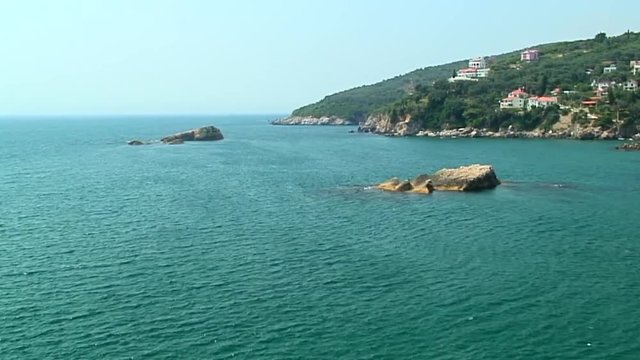 Tilt up: Rocky Coastline of Montenegro
