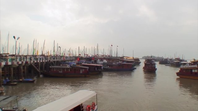 Boats Docked at Busy Wharf