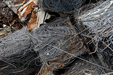 Closeup of scrap metal bales bundled for recycling ,old steel,