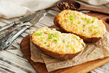 Sweet potatoes stuffed with eggs, cheeese and herbs
