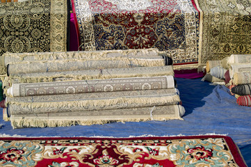 Rolled carpets on pile