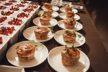 delicious snack profiteroles at wedding catering