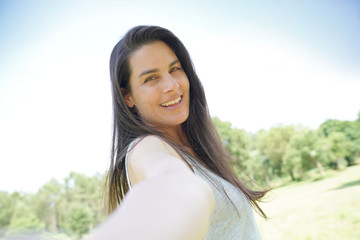 Portrait of smiling beautiful brunette woman