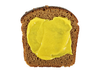 Slice of rye bread and mustard on a white background