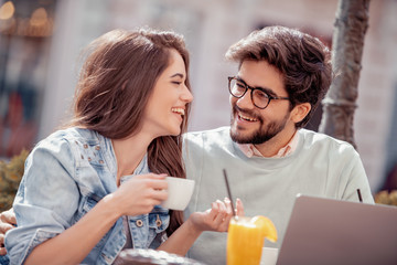 Beautiful couple having coffee on a date
