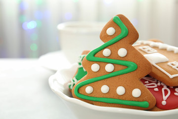 Plate with tasty homemade Christmas cookies, closeup