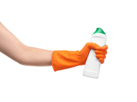 Woman holding bottle of cleaning product on white background