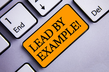 Conceptual hand writing showing Lead By Example Motivational Call. Business photo text Leadership...
