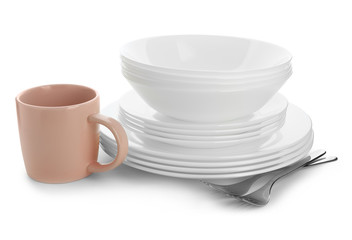 Different clean tableware on white background