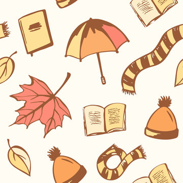 Vector color seamless background with autumn objects: books, leaves, scarfs and others.  Autumn illustration. Seamless fall pattern, warm colors
