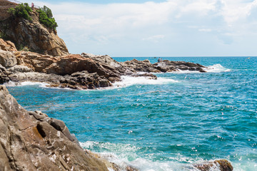 Fototapeta premium Blue Sea Coast Line Sand Stones Beach Mediterranean Nature Background Spain
