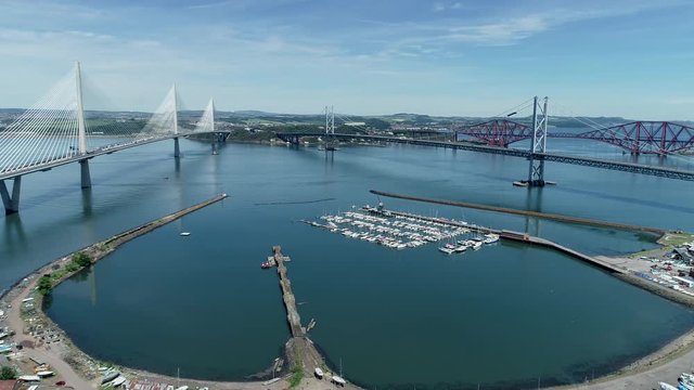 4K aerial footage of the Queensferry Crossing bridge across the Firth of Forth near Edinburgh.