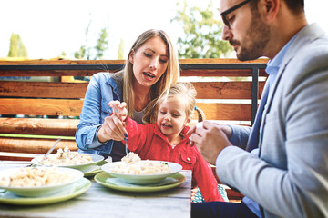 Family enjoying pasta