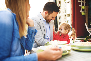Family enjoying pasta
