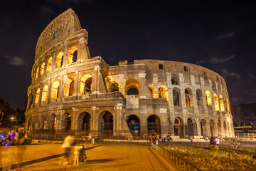 Fototapeta na wymiar Roman Colosseum (Coliseum) at night, one of the main travel attractions in Rome. Italy