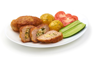 Cutlets cordon bleu with potatoes, tomatoes and cucumbers, isolated on white background.
