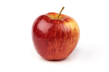 Fresh juicy red apple isolated on white background. Close-up.