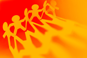 Paper chain team holding hands