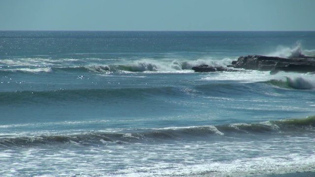 Still: Ocean Waves Crashing on Rocks 