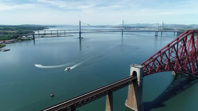 4K aerial footage of the Queensferry Crossing bridge across the Firth of Forth near Edinburgh.