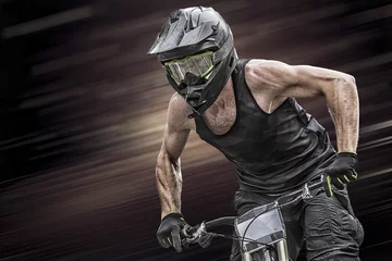 Photo sur Plexiglas Vélo Closeup of a mountain biker while cycling