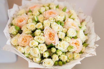 A bouquet of small pink and white roses