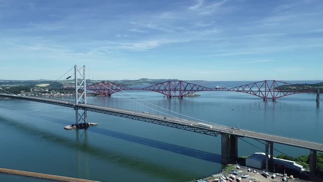 4K aerial footage of the Queensferry Crossing bridge across the Firth of Forth near Edinburgh.