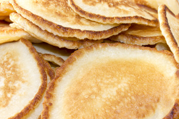 Homemade tasty pancakes for breakfast background closeup
