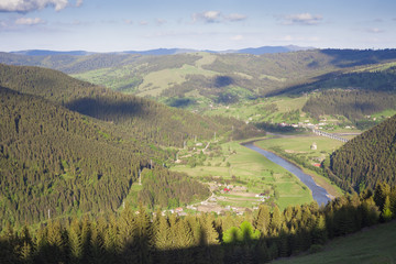 landscape with Bistrita river and countryside scene, Romania