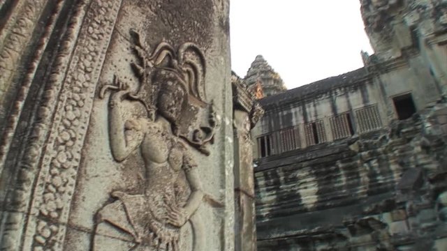 Tower & Carving of an Apsaras at Angkor Wat