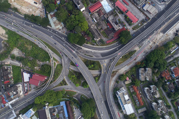 Kuala Lumpur city highway intersection aerial view at sunset, Malaysia