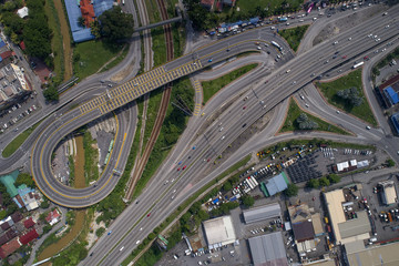 Kuala Lumpur city highway intersection aerial view at sunset, Malaysia