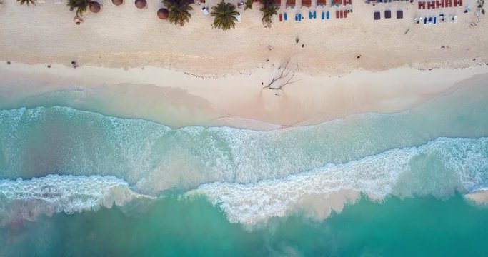 Aerial: Above where the Ocean and Beach Front Touch