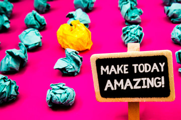 Conceptual hand writing showing Make Today Amazing Motivational Call. Business photo text Productive Moment Special Optimistic Blackboard with white letter pink base much green paper lobs.