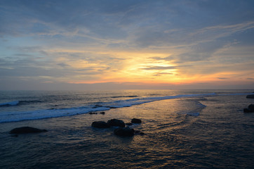 Seascape of the Indian Ocean at sunset. The coast of Sri Lanka