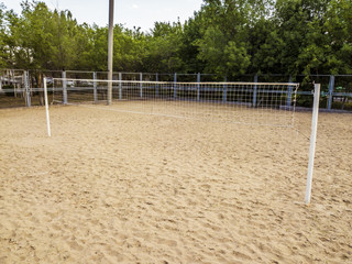 aerial beach volleyball net on the sport sandy ground