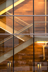 Obraz premium Building Stairway through glass wall (1810037BAND8RF)
