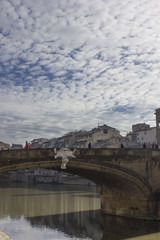 Architectural view of Trinity bridge in Florence at day time on Arno river