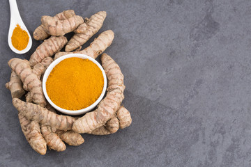 Roots and turmeric powder (Curcuma longa)