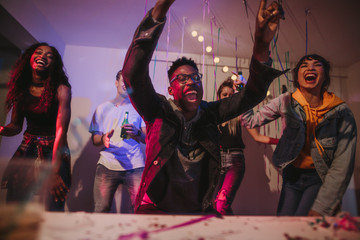 Friends enjoying at a house party