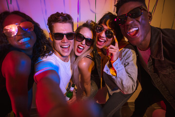 Friends enjoying at a house party