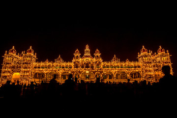 View of Mysore Palace iluminated at night, also known as Ambavilas Palace, Karnataka, India